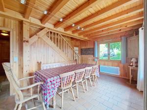 a dining room with a table and chairs at CHALET AVORAZ AVR NATURE & VIEW 10 Pers in Châtel