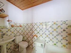a bathroom with a toilet and a sink at CHALET AVORAZ AVR NATURE & VIEW 10 Pers in Châtel +22 photos