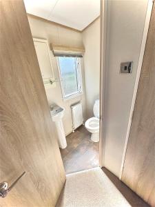 Vannituba majutusasutuses Lodge at Whitehouse leisure park +12 fotot