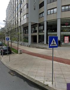 a blue sign in front of a building at Valença RoofTop by Beeflats BnB in Valença