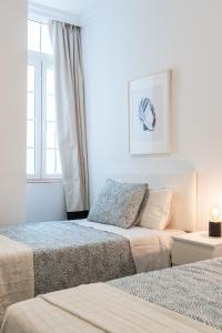 Una cama o camas en una habitación de Profithome Viña Vieja - Boutique Apartment Tenerife