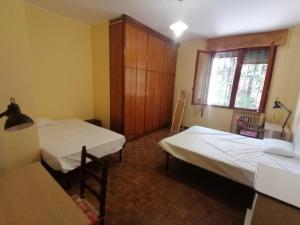 Ένα ή περισσότερα κρεβάτια σε δωμάτιο στο Room Fortuna