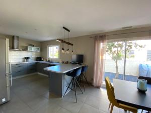 Η κουζίνα ή μικρή κουζίνα στο Chambre d'hôte