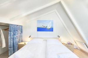 Ένα ή περισσότερα κρεβάτια σε δωμάτιο στο Am Ringwall 91 - Seelöwe B