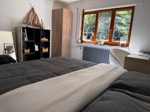 Postel nebo postele na pokoji v ubytování Suite privée indépendante avec sauna et jardin