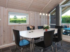 a meeting room with a table and chairs at 4 star holiday home in Hemmet in Hemmet