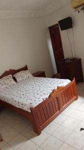 Cama o camas de una habitación en Logement Kabrousse