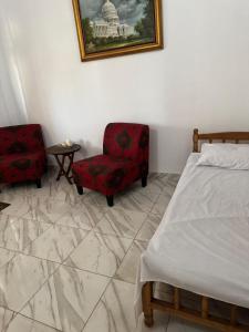 Ένα ή περισσότερα κρεβάτια σε δωμάτιο στο Sun breeze Apartment +1 φωτογραφίες