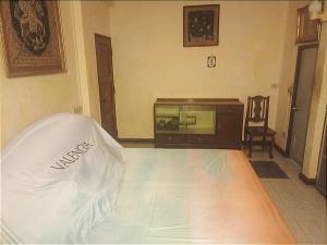 a bedroom with a bed and a dresser at Best Place Have Air Conditioner in Bangkok +9 photos