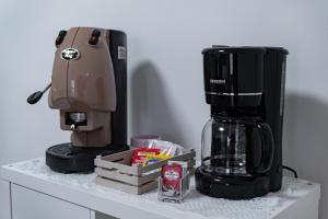 a coffee maker sitting on top of a counter at A casa dei nonni in Scala +19 photos
