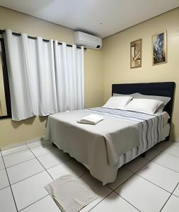 Afbeelding uit fotogalerij van Casa com piscina 03 quartos até 10 pessoas in Rio Branco +51 foto's