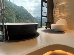 Imagen de la galería de Natureco Boutique Hotel, en Zhangjiajie