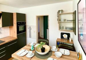 Kuchyň nebo kuchyňský kout v ubytování -Am Pfühlpark- Ferienwohnung