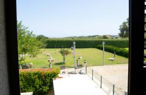 a view of a park with geese in the grass at Giardini di Marzo Lecce B&B in Lecce