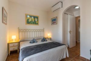 Postel nebo postele na pokoji v ubytování Playa Grande - Playa Punta del Moral PPHG52P15 + 28 fotografií