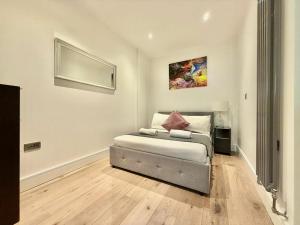 Katil atau katil-katil dalam bilik di Stay Camden Town +4 gambar