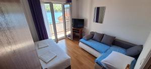 Χώρος καθιστικού στο Apartmani Vuković