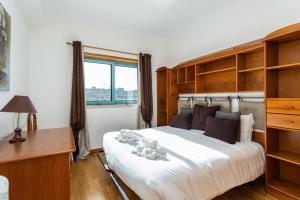 Ένα ή περισσότερα κρεβάτια σε δωμάτιο στο Marina Paradis Bleu