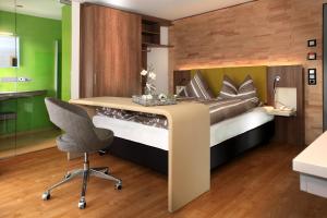 Postel nebo postele na pokoji v ubytování Hotel Adler