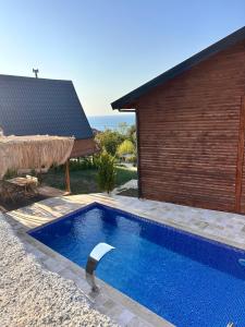 Swimmingpoolen hos eller tæt på Ordu Casa di Arte Bungalov