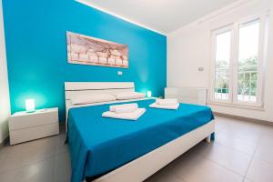 Postel nebo postele na pokoji v ubytování Blue Sky Apartments