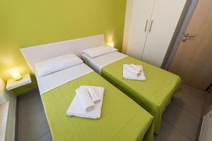 Postel nebo postele na pokoji v ubytování Blue Sky Apartments
