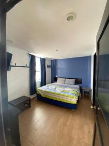 Ένα ή περισσότερα κρεβάτια σε δωμάτιο στο Hotel Santo Domingo