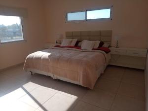 Ένα ή περισσότερα κρεβάτια σε δωμάτιο στο Casa con Pileta Los Arces Pilar +14 φωτογραφίες