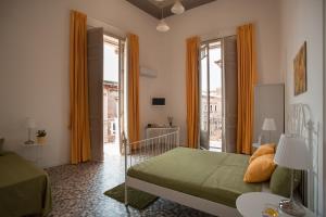 Posteľ alebo postele v izbe v ubytovaní B&B Perla + 37 fotografií