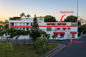 a rendering of a building with a car parked in front at Studios Don Bosco in Santo Domingo