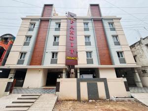 a building with a sign that reads akoya hotel at Hotel PANDIT PALACE in Visakhapatnam