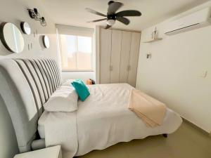 Giường trong phòng chung tại Exclusivo apto con piscina y vista al mar +17 ảnh