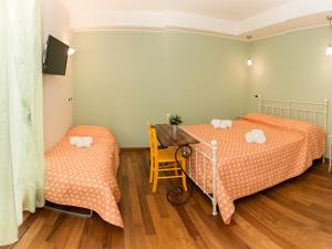 TV a/nebo společenská místnost v ubytování B&B Verdi Colline