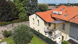 an aerial view of a house with an orange roof at Matteo Luxury Residence in Lomazzo