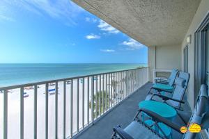 a balcony with a view of the beach at Sea Oats 407 in St Pete Beach