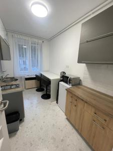 Μια τηλεόραση ή/και κέντρο ψυχαγωγίας στο Manda's Flat