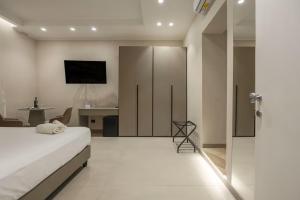 TV a/nebo společenská místnost v ubytování Lolli Boutique & SPA Al Massimo