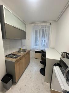 Η κουζίνα ή μικρή κουζίνα στο Manda's Flat +5 φωτογραφίες