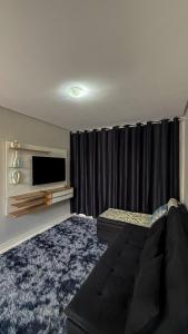 En eller flere senge i et værelse på Charmosa Casa Duplex - Paddington