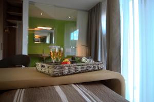 Nápoje v ubytování Hotel Adler