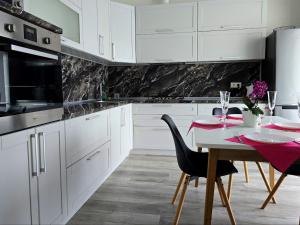 Η κουζίνα ή μικρή κουζίνα στο Apartment 5 star