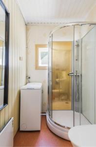 a bathroom with a shower and a toilet and a sink at Beautiful house in Fränsta in Fränsta