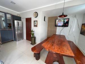 TV a/nebo společenská místnost v ubytování Casa de praia- Mar Azul