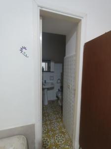 a bathroom with a toilet and a sink at Casa Pesce Rooms Rent in Serrara Fontana