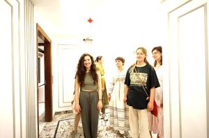 a group of women standing in a hallway at Hotel Star Pink' Couple friendly'Near rk ashram metro in New Delhi