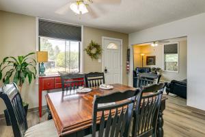 a dining room and living room with a table and chairs at 17 Mi to Bear Lake Lovely Family Home! in Montpelier