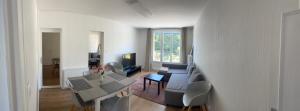 Ruang duduk di Appartement 3 chambres