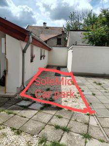 a sign that reads sodiummic cat park in front of a house at Sole Mio Apartment in Szeged