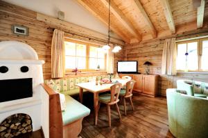 Posedenie v ubytovaní Luxury Chalets Wiesenruh
