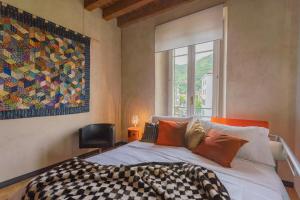 Un ou plusieurs lits dans un hébergement de l'établissement Night at the Museum - FREE Parking by Rent All Como